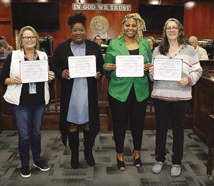 Hardin County employees were honored for lengthy service at a regular meeting of the Hardin County Commissioners Court Tuesday morning. From left are Jeannie Hardy, R&amp;B, five years of service; Shannon Whitley, Health Services Department, 10 years of service; LeTasha Jones, Health Services Department, 15 years of service; and Lisa Finn, 25 years of service. Not shown is Betty Jo Hinson, County Clerk’s Office, 10 years of service. Dan Eakin photo