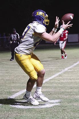 Evadale Rebel Warren Brewer catches a pass that results in a touchdown against the Colmesneil Bulldogs. Melissa Riedinger photo