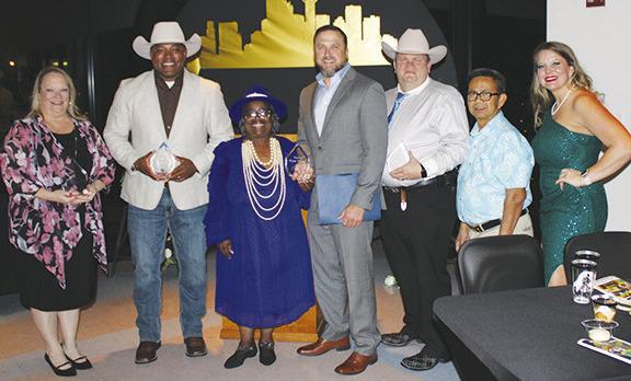 This year’s Silsbee Chamber of Commerce award winners are,from left,Betty Ritcher,Teacher of the Year; Jonta Miller,Citizen of the Year; Donita Banks and Curt Woodard,Toys for Tots, Non-Profit of the Year; Tom Lee, Jay Hinkie Memorial First Responder of the Year; and James Suie, Donut Palace, Business of the Year.At right is Melissa Smart,chamber executive director. Dan Eakin photo