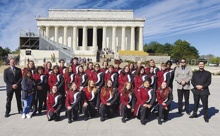 Members of the Silsbee High School band pose in Washington, D.C., in front of the Lincoln Memorial where they performed Monday during their spring break. Courtesy photo