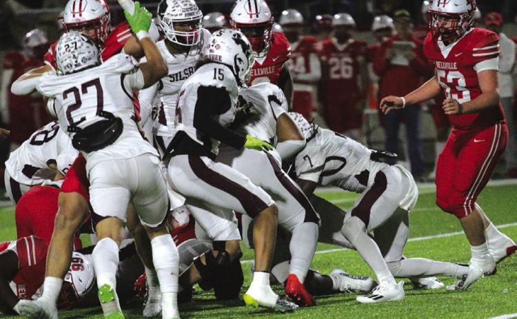 Silsbee football players do everything they can to undercut a much bigger Bellville team and stop the run. Pablo Lorenzi, Lamarcus Bottley, Raydrian Cartwright,and Jaydon Smart,are all in on this play. Photos by Danny Reneau