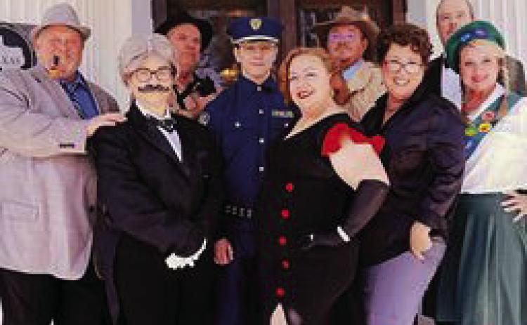 The cast members of ‘Murder Me Once’ pose in their costumes.The play will run every weekend in April at the Silsbee Little Theatre, located at 106 6th Street. Courtesy photo