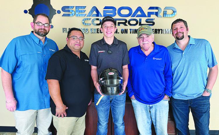 Ryder Wells of Seaboard Controls is moving from Lumberton to North Carolina. From left are Landon Frioux, Ralph Flores, Ryder Wells, Philip Muro and Anthony Muro. Courtesy photo